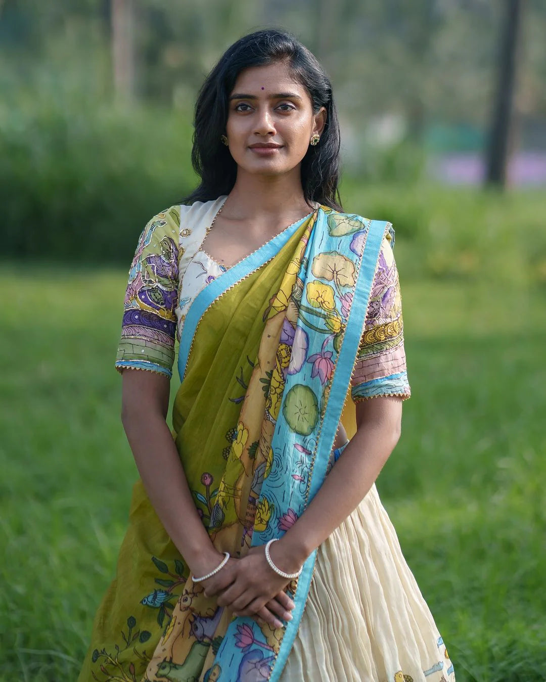 Cream and Mustard Kalamkari Lehenga with Pastoral Motif and Blue Border