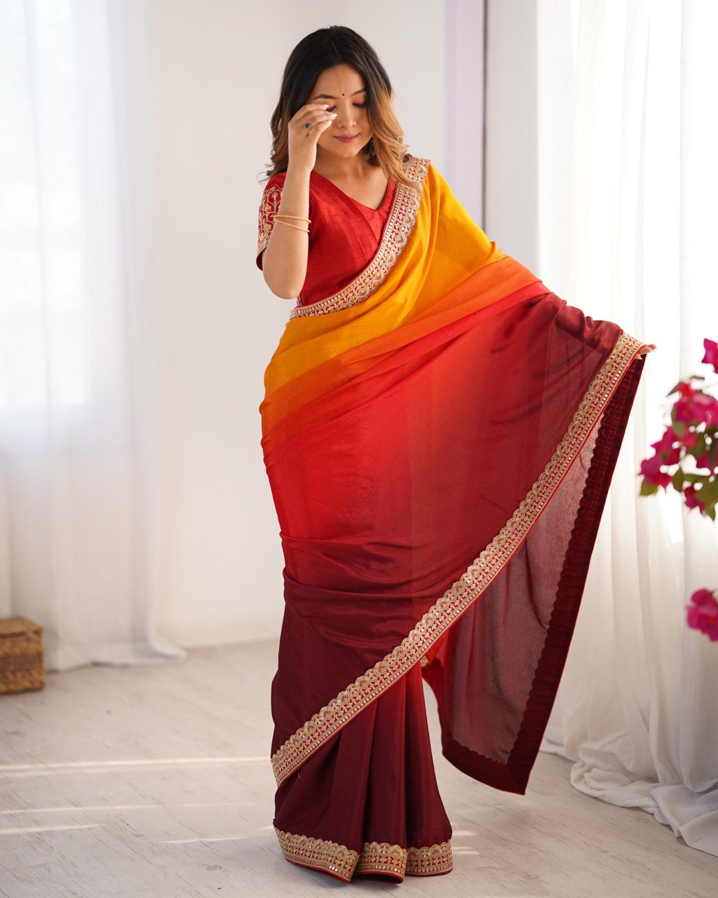 "Radiance in Every Drape: A Fiery Fusion of Sunset Hues"