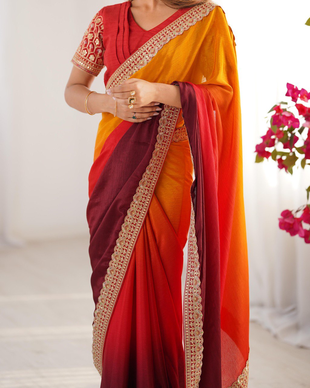 "Radiance in Every Drape: A Fiery Fusion of Sunset Hues"