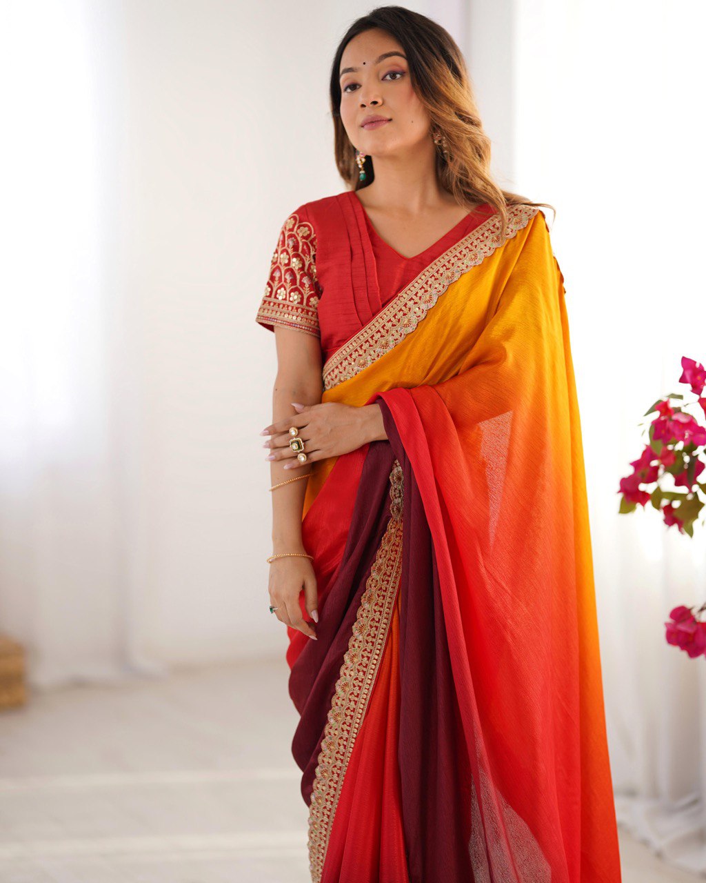 "Radiance in Every Drape: A Fiery Fusion of Sunset Hues"